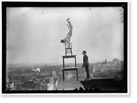 REYNOLDS, J., PERFORMING ACROBATIC AND BALANCING ACTS ON HIGH CORNICE ABOVE 9TH STREET, N.W. - 6, Antique Poster