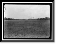 Historic Framed Print, ALLIED AIRCRAFT DEMONSTRATION AT POLO GROUNDS. HANGARS; PLANES, AVRO AND CURTIS BEING CONDITIONED - 2,  17-7/8" x 21-7/8"