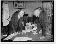 Historic Framed Print, Eye to eye. Washington, D.C., Dec. 18. George Whitney, a partner in the J.P. Morgan Co., being questioned by Chairman Burton K. Wheeler at the Senate Railroad Financing Inquiry today,  17-7/8" x 21-7/8"