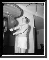 Rep. Albert Thomas of Tex. punching the bag at the House gym, Antique Poster