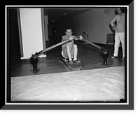 Rep. Albert Thomas of Tex. on the rowing machine at the House gym, Historic Print