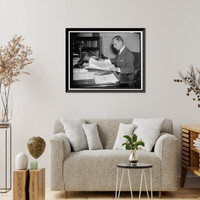 Historic Framed Print, T.A.M. Craven, Chairman of the Federal Communications, looking over his new commission,  17-7/8" x 21-7/8"