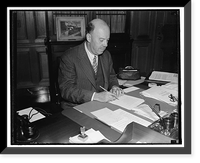 New Commissioner of Immigration. Washington, D.C., Aug. 26. James L. Houghsteling, of Chicago, photographed at his desk shortly after he took the oath of office as U.S. Commissioner of Immigration