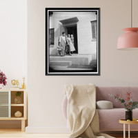 Historic Framed Print, Mr. and Mrs. Irving Machiz, with their son, Edward, moving into their new quarters at Greenbelt, Resettlement Administration city, 10/2/37,  17-7/8" x 21-7/8"