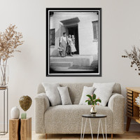 Historic Framed Print, Mr. and Mrs. Irving Machiz, with their son, Edward, moving into their new quarters at Greenbelt, Resettlement Administration city, 10/2/37,  17-7/8" x 21-7/8"