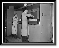 National Archives. Washington, D.C., Nov. 22. After leaving the gas chamber the documents are worked on by air blowers to eliminate all dust and foreign particles, Historic Reproduction