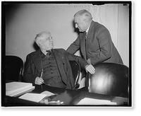 Pennsylvania Senators. Washington, D.C., Mar. 14. Apparently unworried by the incoming elections, Senators James J. Davis, R. of Penna., seated, jokes with Joseph Guefey, D. of Penna. Vintage Wall