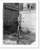 Baby on large unicycle held up by ropes, Antique Poster