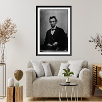 Abraham Lincoln, half-length portrait, seated, with pencil and spectacles retouched, Antique Poster