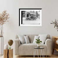Historic Framed Print, G.G. Bain in auto in front of restaurant No. 32 (No. 34 Japan Paper Co.),  17-7/8" x 21-7/8"