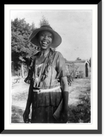 Smiling woman, three-quarter-length portrait of unidentified person standing outdoors, Historic Print