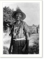 Smiling woman, three-quarter-length portrait of unidentified person standing outdoors, Historic Print