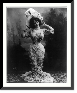 Anna Held, full-length portrait, standing, facing front with both hands raised behind her head, Vintage Print