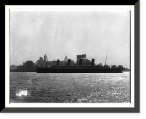 The S.S. OLYMPIC, 1911: Full lgth. port view with New York skyline in backgrd, Historic Print