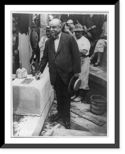 Nicholas Murray Butler, 1862-1947, full-length portrait, standing alongside cornerstone to be layed at the Italian House of Columbia University, facing left, Historic Reproduction