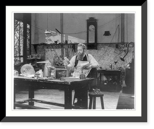 Wilhelm Konrad Roentgen, 1845-1923 (actor posing as Roentgen?); full, seated, in laboratory amid equipment, Antique Print