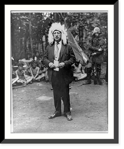Alfred Emanuel Smith, 1873-1944, full-length portrait, standing, with Indian headress, facing left, after having been crowned Grand Sachem" by Boy Scouts of NY & NJ", Antique Print