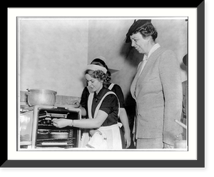 Historic Framed Print, [Eleanor (Roosevelt) Roosevelt 1884-1962: watching Girl Scouts baking, left profile],  17-7/8" x 21-7/8"