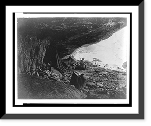 Man seated beneath rock formation at the Upper Yosemite Fall, Yosemite National Park, Calif, Vintage Print