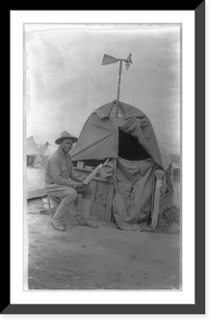 24th Infantry Reg. (Negro) in Mexico, 1916: man reading paper by his tent shack, Historic Print