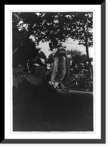 Robert Weeks DeForest, 1848-1931, standing in open limousine, in top hat and fur coat, Historic Print