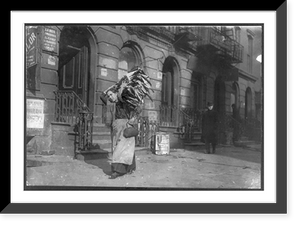 Historic Framed Print, Tired woman with heavy load of home-work. Lafayette St., near Astor Place. Location: New York, New York (State),  17-7/8" x 21-7/8"