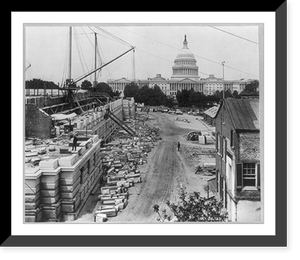 Historic Framed Print, [View of construction of the basement and first floor of the Library of Congress on the north side, with the U.S. Capitol in the background],  17-7/8" x 21-7/8"