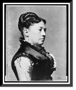 Mrs. Ulysses S. Grant, full-length portrait, standing, facing right, between table and chair, Historic Print