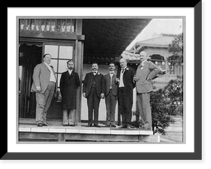 Secretary Taft and his personal military staff and Mr. Nagasaki, the Emperor's representative at the Shiba Detached Palace, Tokyo, Japan; standing on porch, Antique Print