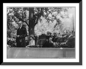 Calvin Coolidge, three-quarters length portrait, standing, facing left, making speech at Harvard College, Historic Print