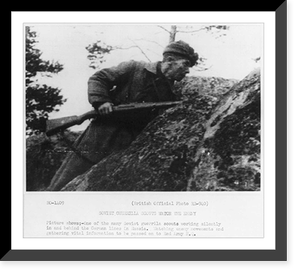 Soviet guerrilla activity in Russia, WWII: Scout with rifle watching enemy, Historic Reproduction