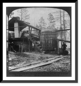 Historic Framed Print, Distilling turpentine from the crude resin in the pine forests of North Carolina,  17-7/8" x 21-7/8"
