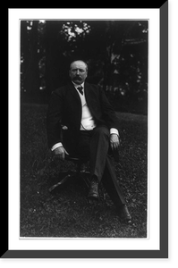 Alton Brooks Parker, 1852-1926, full length portrait, seated, legs crossed, on office chair on lawn, facing front, Antique Print