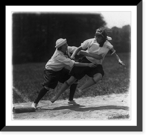 Virginia Smoot of Columbia Jr. High School tagged out at third by Mabel Harvey of McFarland School during the ball game which was part of the field day of the junior high schools today Vintage Wall