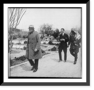 Winston Churchill, Lawrence of Arabia, and Emir Abdullah walking in the gardens of the Government House, Jerusalem, during secret conference Classic, Antique Poster