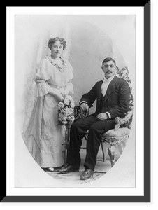 Historic Framed Print, [Wedding picture, man seated and woman holding flowers and standing],  17-7/8" x 21-7/8"