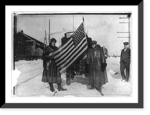 Historic Framed Print, New York-to-Paris automobile race: [Two men holding U.S. flag behind automobile],  17-7/8" x 21-7/8"