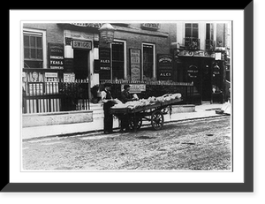 Historic Framed Print, [2 men by wagonload of china(?) in front of the London & Naval Hotel, London, 1884(?)],  17-7/8" x 21-7/8"