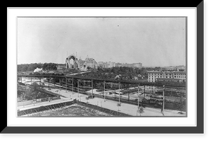 Historic Framed Print, New York City: Morningside Park and Cathedral Heights, showing construction of Cathedral of St. John the Divine; elevated train in fg.,  17-7/8" x 21-7/8"