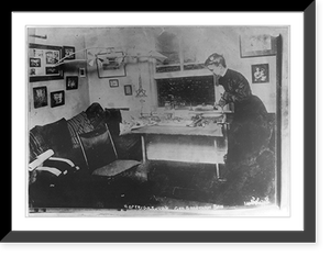 E. Lillian Todd standing at table, Vintage Poster
