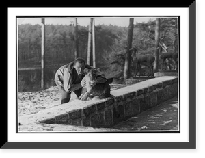 Historic Framed Print, [Goering posed with his pet lion, Mucki],  17-7/8" x 21-7/8"