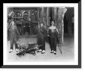 3 men with canes, wearing dirty clothing, top hats, spats, and monocles, looking over a portion of the partially wrecked Waldorf, New York City, Vintage Print