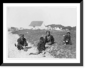 Aleutian Islands? : 4 Indian boys seated on ground, buildings in backgrd, Vintage Wall Art
