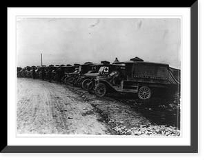 American Red Cross ambulances lined up along road in France during the war, 1914-1918(?), Vintage Poster