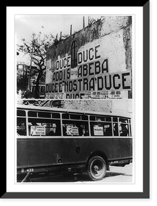 Signs on wall and windows of bus proclaiming victory in Addis Ababa, Rome, Italy, Vintage Print
