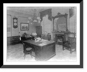 Government office with man seated at desk, Washington, D.C.; large mirror over fireplace behind him Classic, Antique Print