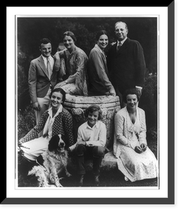 Eugene and Agnes Meyer with children in garden - two sitting on urn of fountain, others on base, dog in foreground, Vintage Wall Art