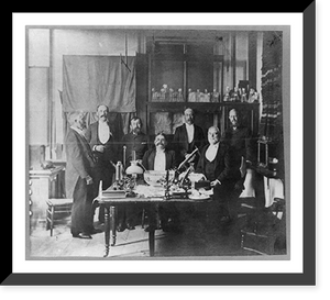 Group of 7 chemists around table with laboratory equipment Classic, Historic Reproduction