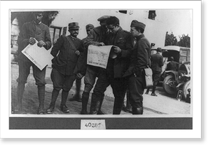 Historic Military - Soldiers reading reports of victory at the Italian