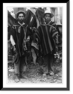 2 men of the high Andes between Cuenca and Loja, Ecuador posed, holding cans and shoes, Antique Poster